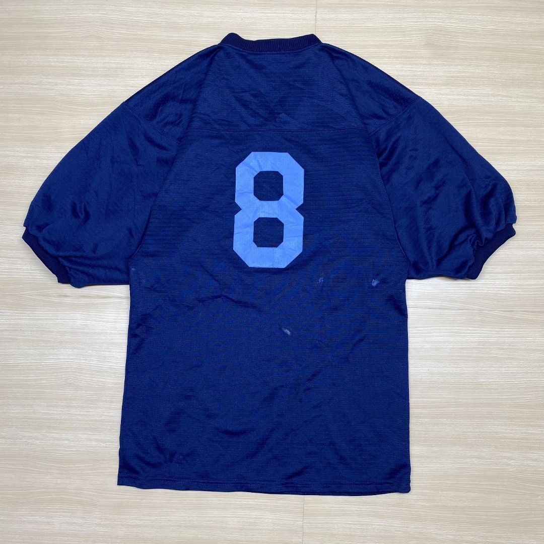 Vintage Burbank Huskies Jersey (Category: Tshirts & Polo Shirts ) located in Navotas City. Submitted by jericafits (Listing ID 1435267220, Image 2). Description: • Burbank Huskies NFL Jersey 📏 Size: M 📏 Dimes: 18.5 x 29 ₱ 399 + sf - Vintage navy blue jersey - Features "BURBANK HUSKIES" print and husky graphic - Number "8" on the back - V-neck design with short sleeves - Brand: "TEAMWORK ATHLETIC APPAREL".
