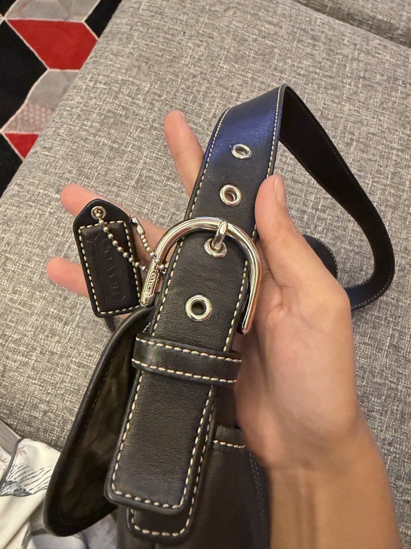 Vintage Coach Soho Buckle Flap Bag (Category: Luxury Bags & Wallets) located in San Jose. Submitted by affordabletrendsby_cai (Listing ID 1435178132, Image 2). Description: - Black leather Coach shoulder bag - Flap closure with silver buckle - Adjustable long strap - Coach logo patterned interior - White stitching details - Includes Coach tag - Model number: A05S-9480.