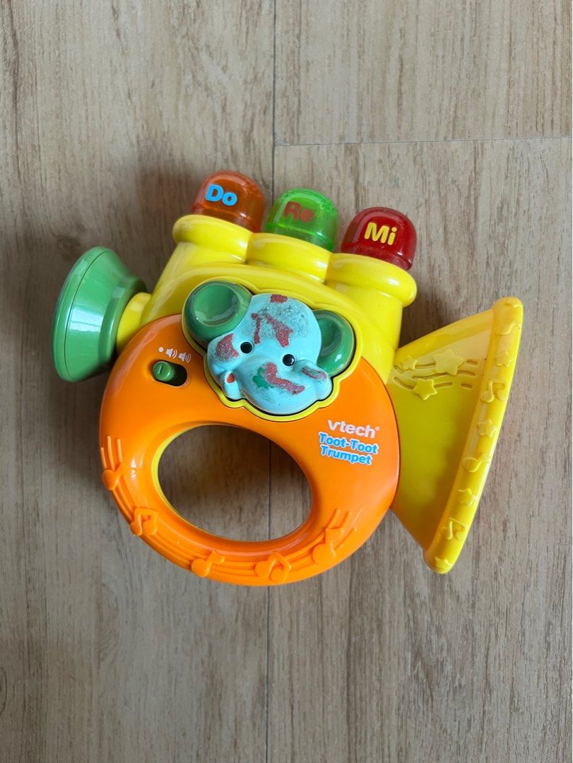 Vtech Toot Toot Trumpet Toy (Category: Infant Playtime) located in Pasig City. Submitted by grndhub (Listing ID 1435263465, Image 1). Description: Decluttering Vtech toot toot trumpet toy 6+ months Working (batteries not included) Pre loved Pick up Pasig.