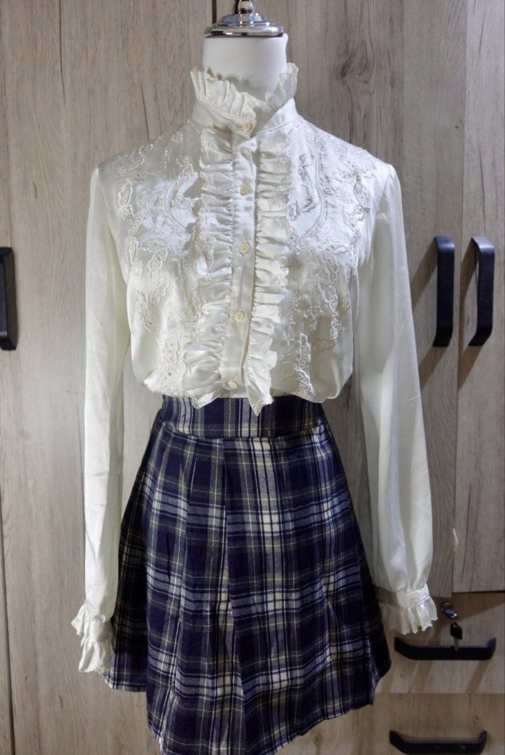 White long sleeve blouse (Category: Blouses) located in Cavite. Submitted by archimage (Listing ID 1435260797, Image 2). Description: - White long sleeve blouse - Satin - Size S - Flaws: Few loose threads and minimal stains.