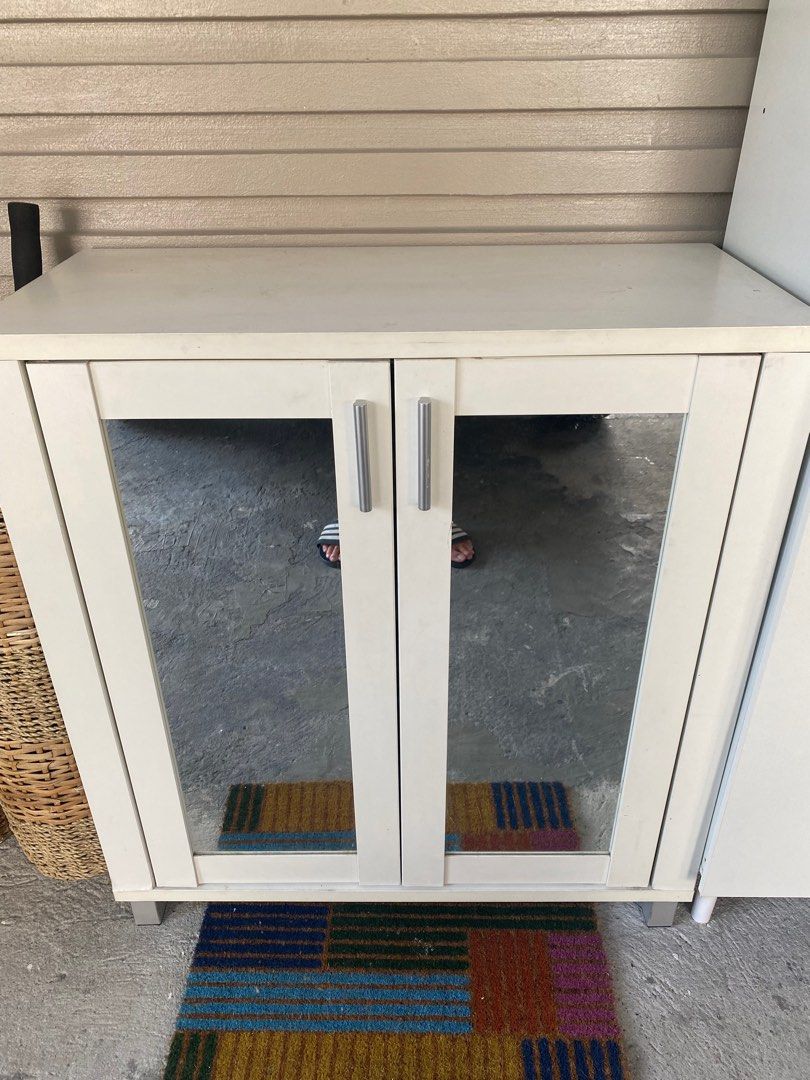 White Shoe Cabinet with Mirror Doors (Category: Shelves, Cabinets & Racks) located in Taguig. Submitted by timeandplace (Listing ID 1435179955, Image 2). Description: 83 cm width 38 cm depth 93 cm height Ships from Pasig, still in good condition and very good quality. Can fit a lot of shoes!.