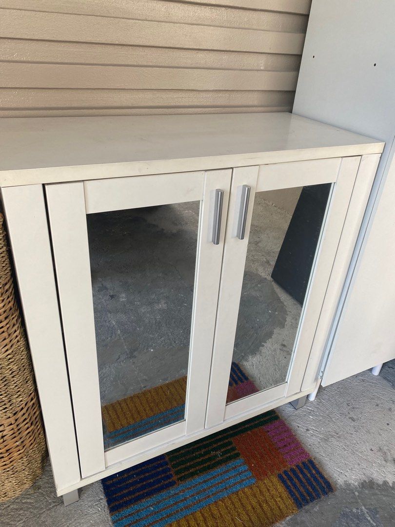 White Shoe Cabinet with Mirror Doors (Category: Shelves, Cabinets & Racks) located in Taguig. Submitted by timeandplace (Listing ID 1435179955, Image 3). Description: 83 cm width 38 cm depth 93 cm height Ships from Pasig, still in good condition and very good quality. Can fit a lot of shoes!.