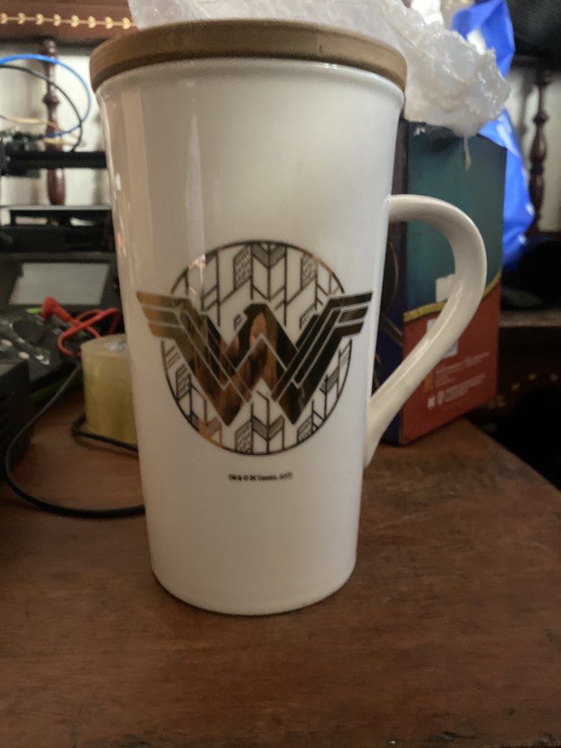 Wonder Woman Ceramic Mug 500ml (Category: Coffee & Tea Tableware) located in Marikina City. Submitted by jtv17 (Listing ID 1435173604, Image 2). Description: - Wonder Woman ceramic mug - Includes lid no spoon - 500ml capacity - Features the iconic Wonder Woman logo - Great for any fan!.