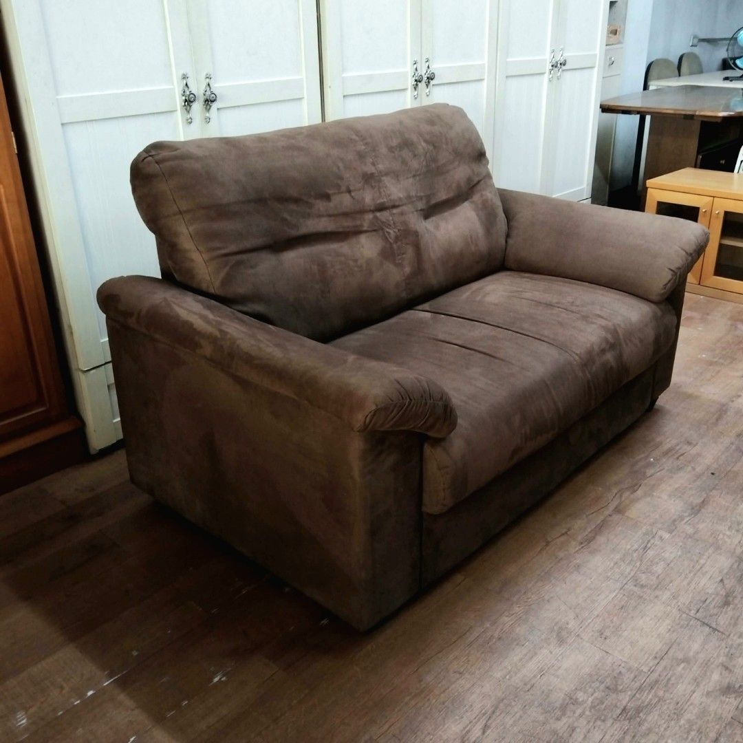 2nd hand Comfy Velvet Brown 2-Seater Sofa (Category: Sofas) located in Paranaque City. Submitted by feybelhaft (Listing ID 1430137593, Image 3). Description: Comfortable 2-seater sofa in a rich brown color. Dimensions are L146cm x D88cm x H88cm, with a seat height of 42cm. Features a plush, inviting design perfect for relaxing. The sofa has a sturdy frame and is ready for immediate use. Ideal for living rooms or lounges..