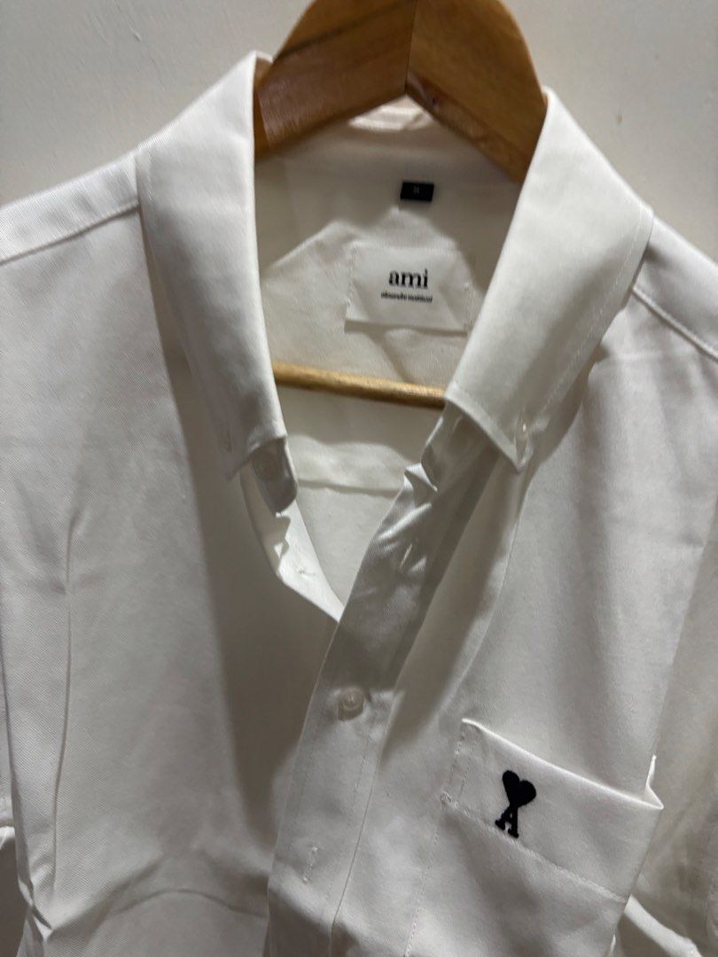 Ami white polo (Category: Luxury Apparel) located in Bacolod City. Submitted by sheenlythingsforyou (Listing ID 1430100031, Image 2). Description: .