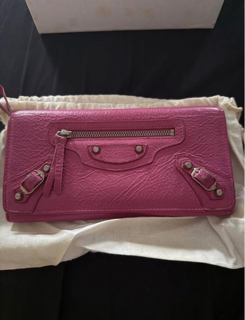 Balenciaga Classic Continental Wallet (Category: Luxury Bags & Wallets) located in Manila. Submitted by gabbieeigenmann (Listing ID 1430154947, Image 1). Description: Balenciaga Classic Continental Zip Long Wallet in fuchsia textured lambskin leather. .