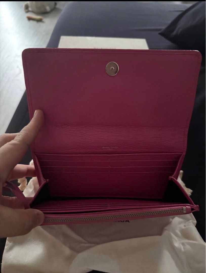 Balenciaga Classic Continental Wallet (Category: Luxury Bags & Wallets) located in Manila. Submitted by gabbieeigenmann (Listing ID 1430154947, Image 2). Description: Balenciaga Classic Continental Zip Long Wallet in fuchsia textured lambskin leather. .