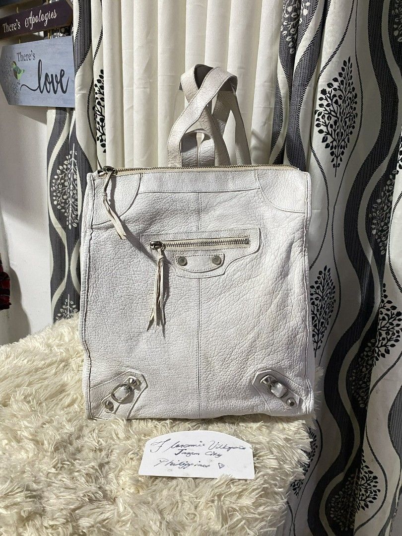 Balenciaga White Leather Backpack (Category: Luxury Bags & Wallets) located in Tagum. Submitted by janmarion049706 (Listing ID 1430194123, Image 1). Description: with sign of use may tanggal rubber lining sa strap genuine leather retouched good condition super tibay.
