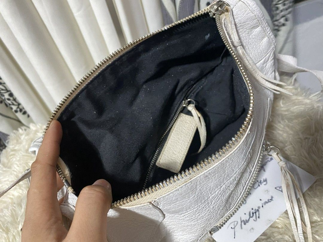 Balenciaga White Leather Backpack (Category: Luxury Bags & Wallets) located in Tagum. Submitted by janmarion049706 (Listing ID 1430194123, Image 3). Description: with sign of use may tanggal rubber lining sa strap genuine leather retouched good condition super tibay.