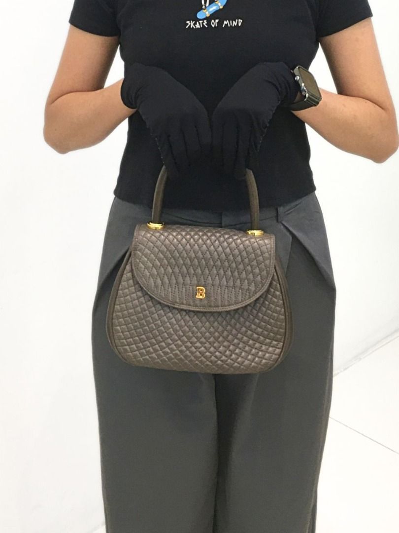 BALLY Quilted Top Handle Bag (Pre-owned Authentic) (Category: Luxury Bags & Wallets) located in Santa Rosa. Submitted by brandieshoppe (Listing ID 1430119157, Image 2). Description: ✅ Authentic/Original Preloved ✅ From Japan Auction ✅ Money-back Guaranteed If Proven Fake ✅ Message Us For More Details ✅ Open for Layaway Disclaimer: All items sold are preloved unless otherwise stated as brand new. As pre-owned items, signs of previous use, wear, or