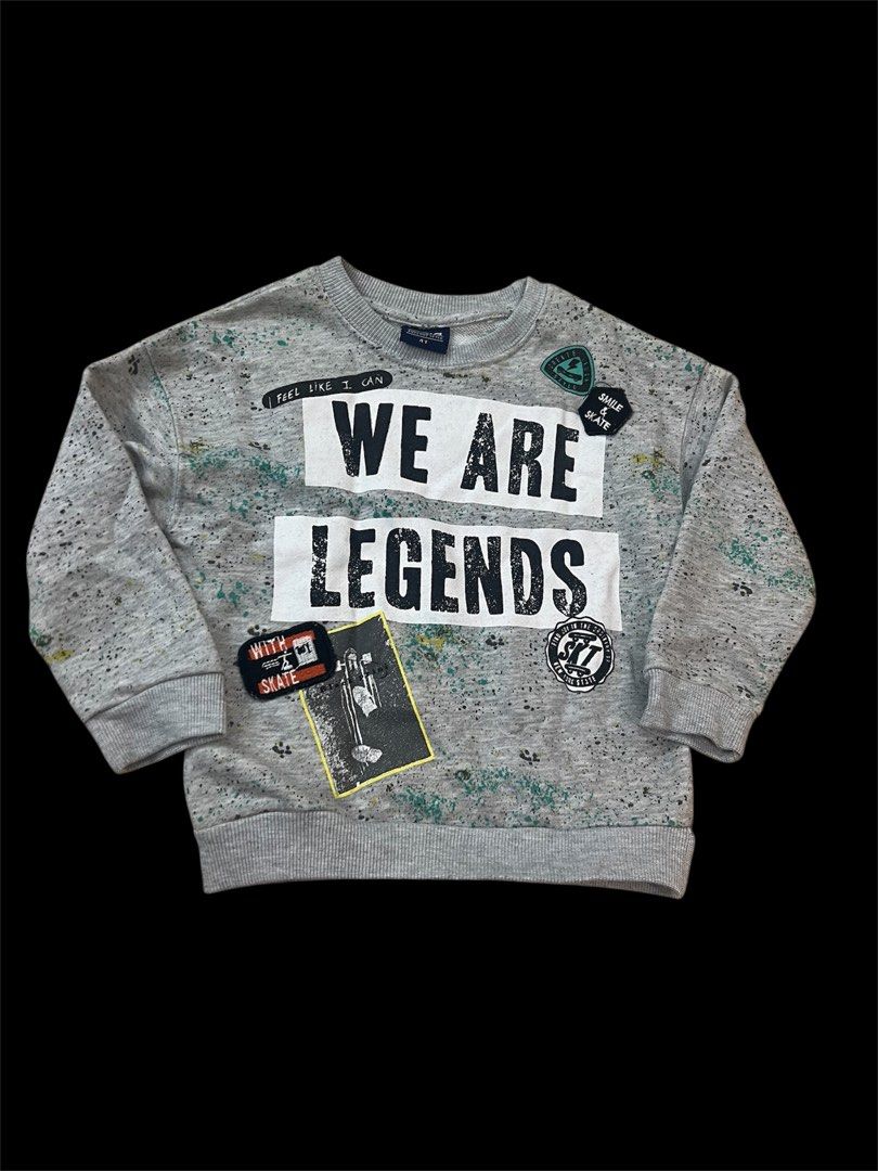BGS Boys Got Style Sweatshirt 4T (Category: Babies & Kids Fashion) located in Mandaluyong City. Submitted by one.stopshop (Listing ID 1430115494, Image 1). Description: Gray sweatshirt from BGS Boys Got Style. Features the text "WE ARE LEGENDS" on the front. Includes various patches and graphic details. Size 4T. Made of a comfortable material, perfect for everyday wear. A stylish and fun addition to any young boy's wardrobe..
