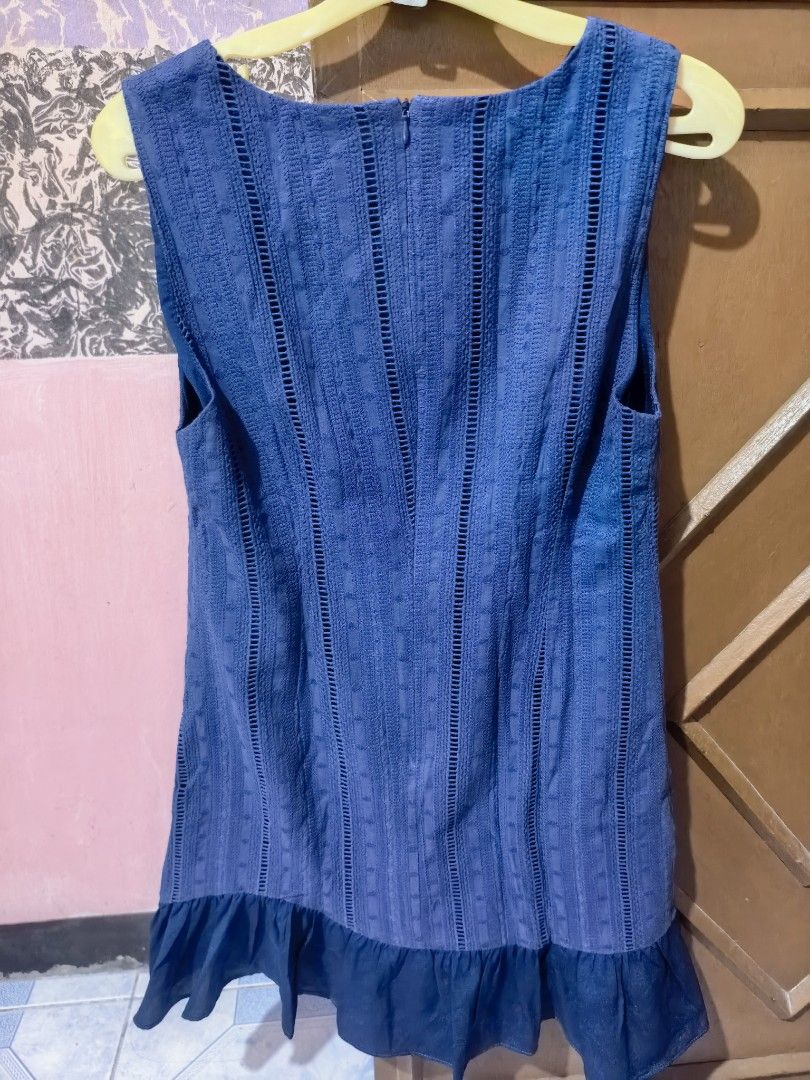 Blue Sleeveless Dress (Category: Dresses) located in Dinalupihan. Submitted by colinnoceda (Listing ID 1430080900, Image 2). Description: Sleeveless dress features a unique textured design and a ruffled hem. It has a round neckline and a zipper closure at the back. The dress is a solid blue color. 💼✨.
