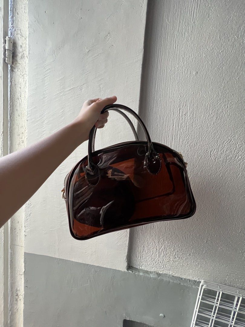 Bowler Bag in Coffee (Category: Cross-body Bags) located in Manila. Submitted by hellotrish (Listing ID 1430201045, Image 2). Description: 👜Comes with a small pouch and strap Made with pvc (high quality pvc) This is one of our best sellers. Locally Made ✨ MARIKINA ✨ J&T, Lalamove📦 Strictly Payment First.