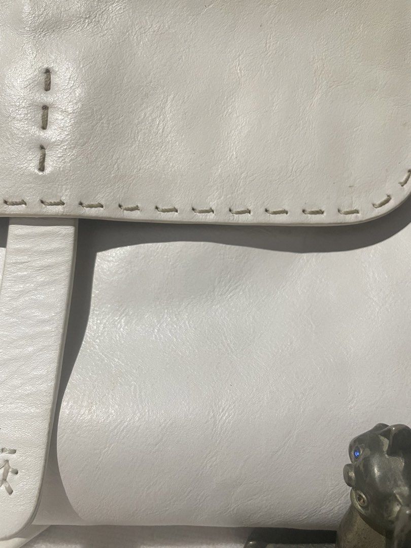 Calfskin Leather White Sling Bag (Category: Cross-body Bags) located in Antipolo. Submitted by lilhermes (Listing ID 1430038221, Image 3). Description: In very good condition Wide: 14inches Height: 10 inchez .