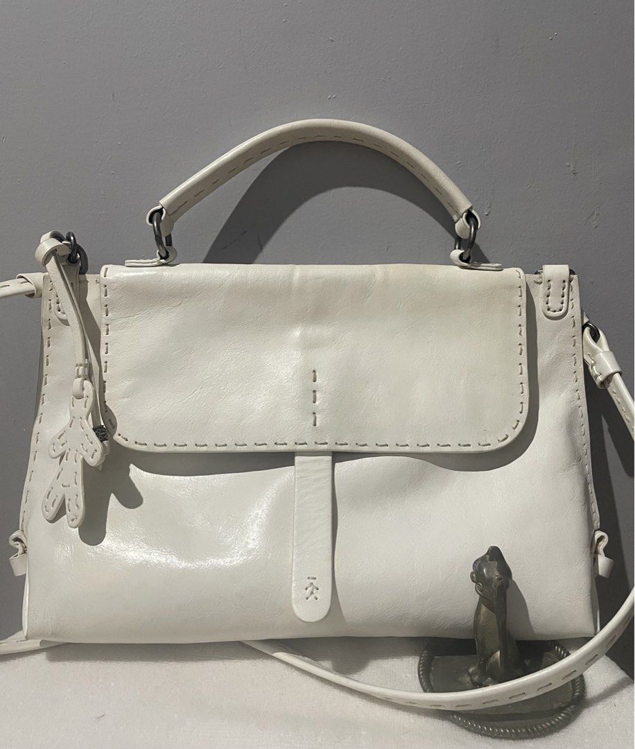 Calfskin Leather White Sling Bag (Category: Cross-body Bags) located in Antipolo. Submitted by lilhermes (Listing ID 1430038221, Image 1). Description: In very good condition Wide: 14inches Height: 10 inchez .