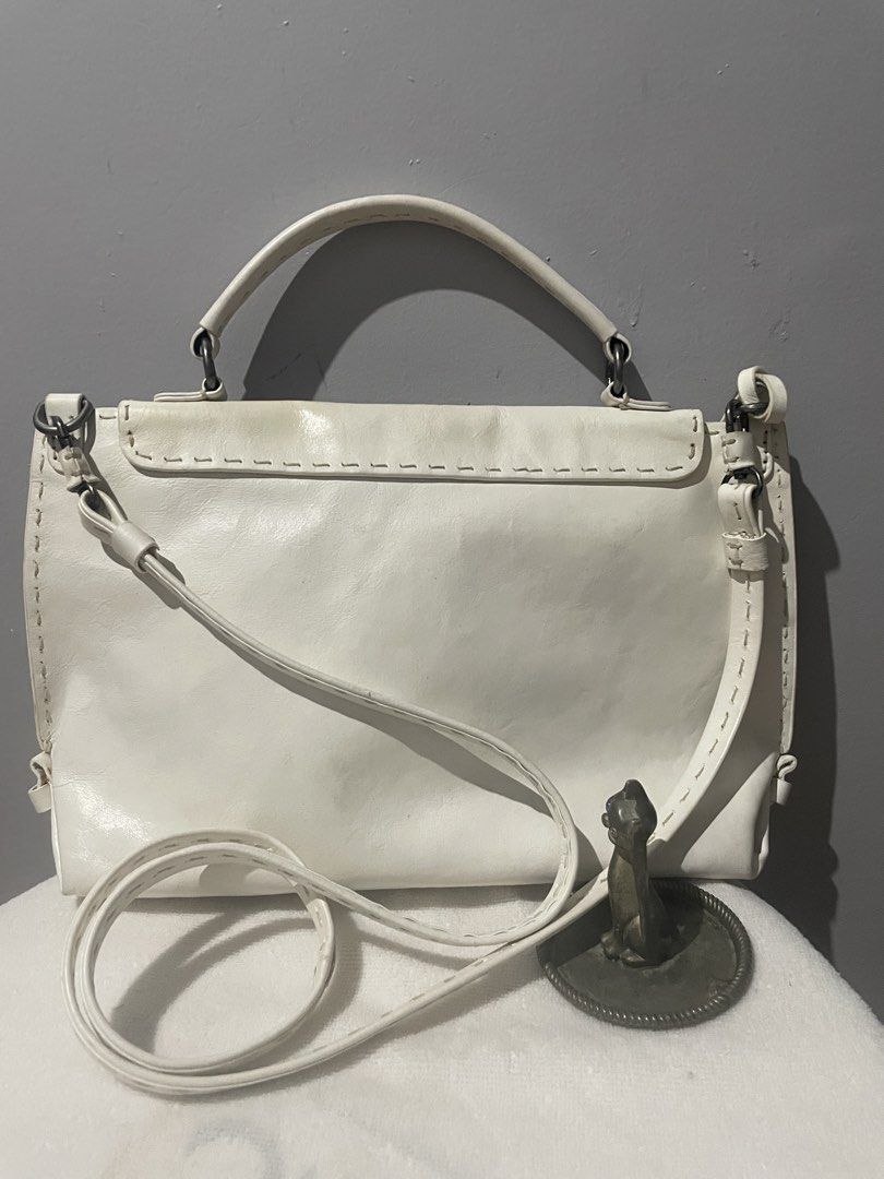 Calfskin Leather White Sling Bag (Category: Cross-body Bags) located in Antipolo. Submitted by lilhermes (Listing ID 1430038221, Image 2). Description: In very good condition Wide: 14inches Height: 10 inchez .