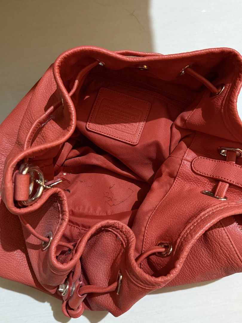Vintage Coach Drawstring Bucket Bag (Category: Luxury Bags & Wallets) located in Manila. Submitted by wardrobepal (Listing ID 1430201345, Image 3). Description: • 100% authentic • Flaws: only inside the bag; minimal ballpen ink marks • Very chic — spacious enough for everyday use • Looks new; barely used.