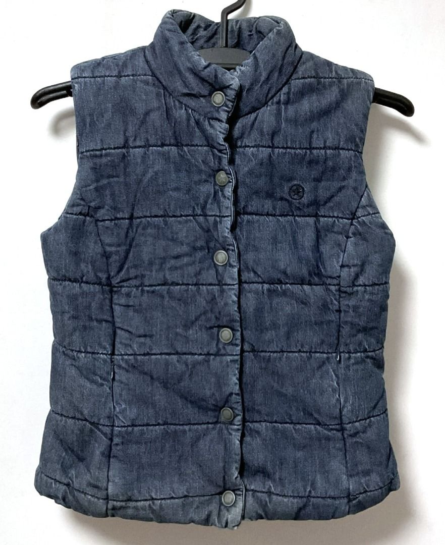 Converse One Star Denim Puffer Vest (Category: Coats, Jackets and Outerwear) located in Quezon City. Submitted by sustainable.sarah (Listing ID 1430099684, Image 1). Description: A vintage-inspired piece known for its blend of classic streetwear aesthetics and functional warmth. Product measurements in inches: Armpit: 17.5 Shoulder: 13 Length: 20.5.
