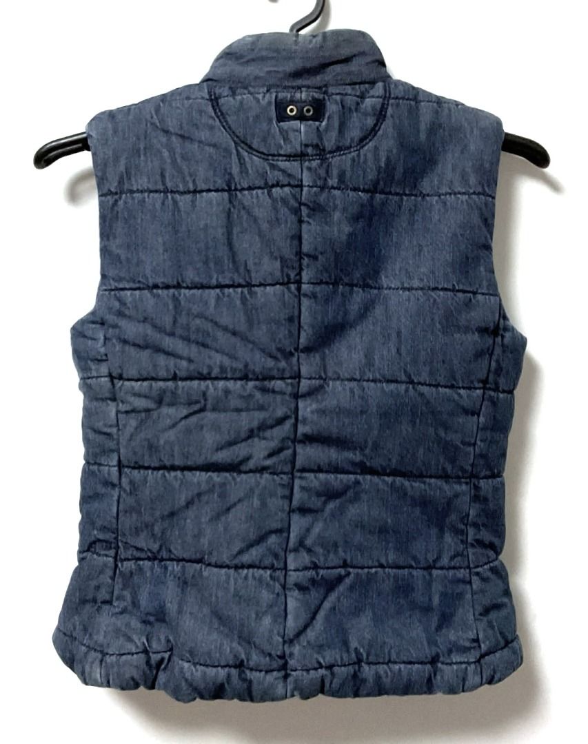 Converse One Star Denim Puffer Vest (Category: Coats, Jackets and Outerwear) located in Quezon City. Submitted by sustainable.sarah (Listing ID 1430099684, Image 2). Description: A vintage-inspired piece known for its blend of classic streetwear aesthetics and functional warmth. Product measurements in inches: Armpit: 17.5 Shoulder: 13 Length: 20.5.