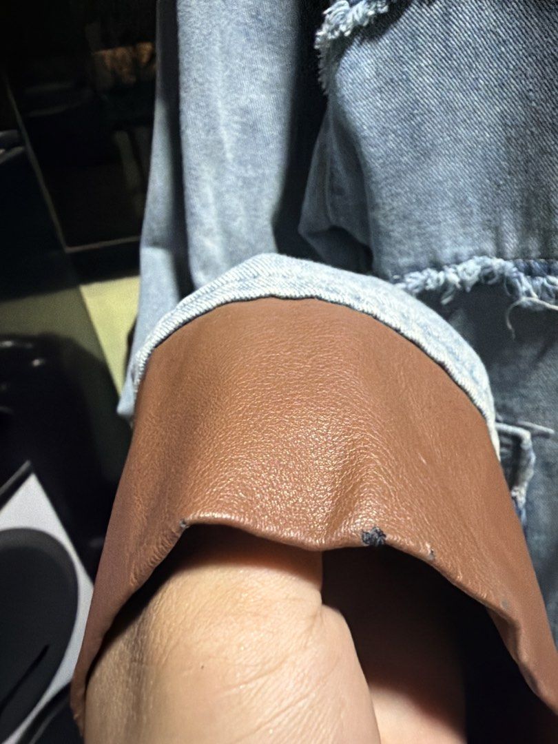 Denim Jacket with Brown Leather Collar (Category: Coats, Jackets and Outerwear) located in Makati City. Submitted by secondselection (Listing ID 1430146863, Image 3). Description: Kinda deteriorating, you can hide the flaws by folding inside for the sleeves and forthe neck, just close the zipper. Outside of neck, no flaws. Or you can fold a little bit. W 23 L 25.5.