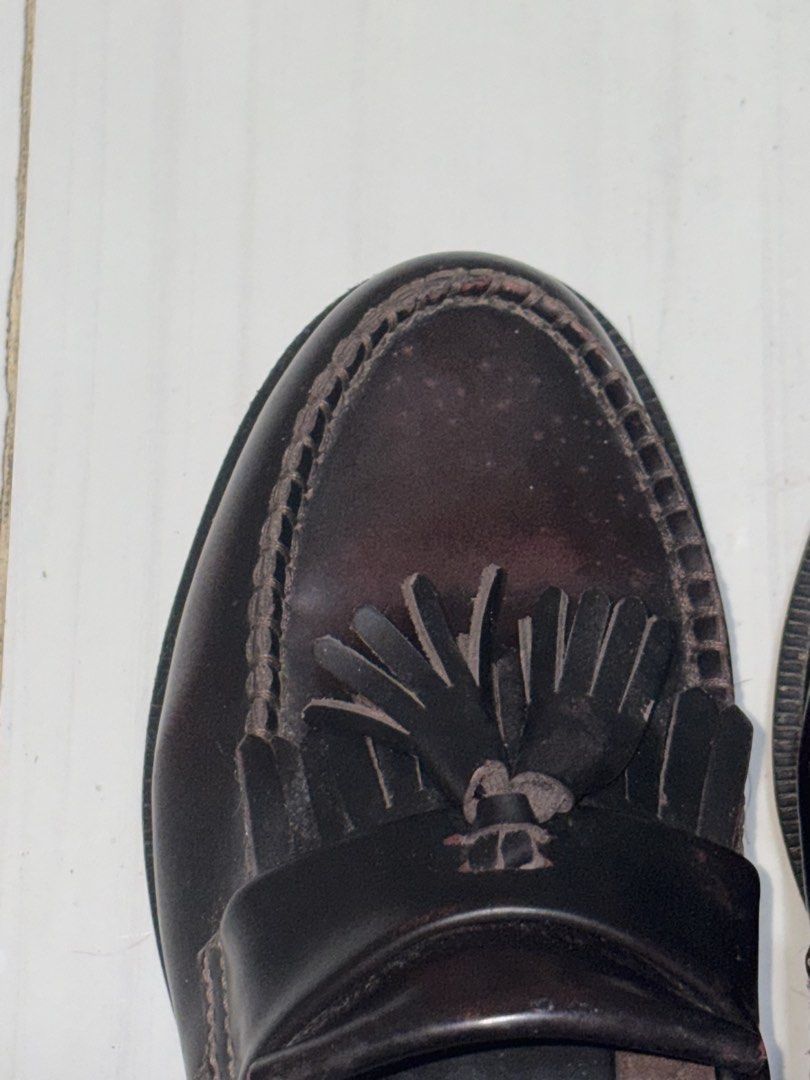Dr. Martens Adrian Tassel Loafers Cherry Red (Category: Loafers) located in Taguig. Submitted by kaiaworld (Listing ID 1430156529, Image 2). Description: Classic Dr. Martens Adrian Tassel Loafers in a deep burgundy color. Features a tassel detail and the iconic Dr. Martens sole. The stitching and sole still intact. A stylish and durable choice for everyday wear. Size 7 3 times worn Old due to storage see pic.