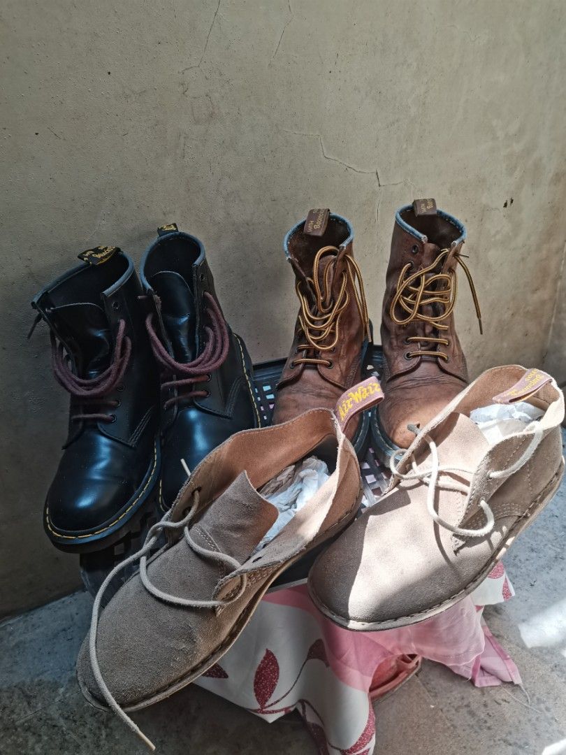 Dr. Martens Boots and Suede (Category: Boots) located in Dasmarinas. Submitted by roydms (Listing ID 1430052110, Image 1). Description: Collection of Dr. Martens boots and suede chukka shoes. The boots are black and brown, with visible laces. The suede shoes are light brown. Perfect for everyday wear or adding a touch of style to any outfit.Will send more photos for interested buyers.
