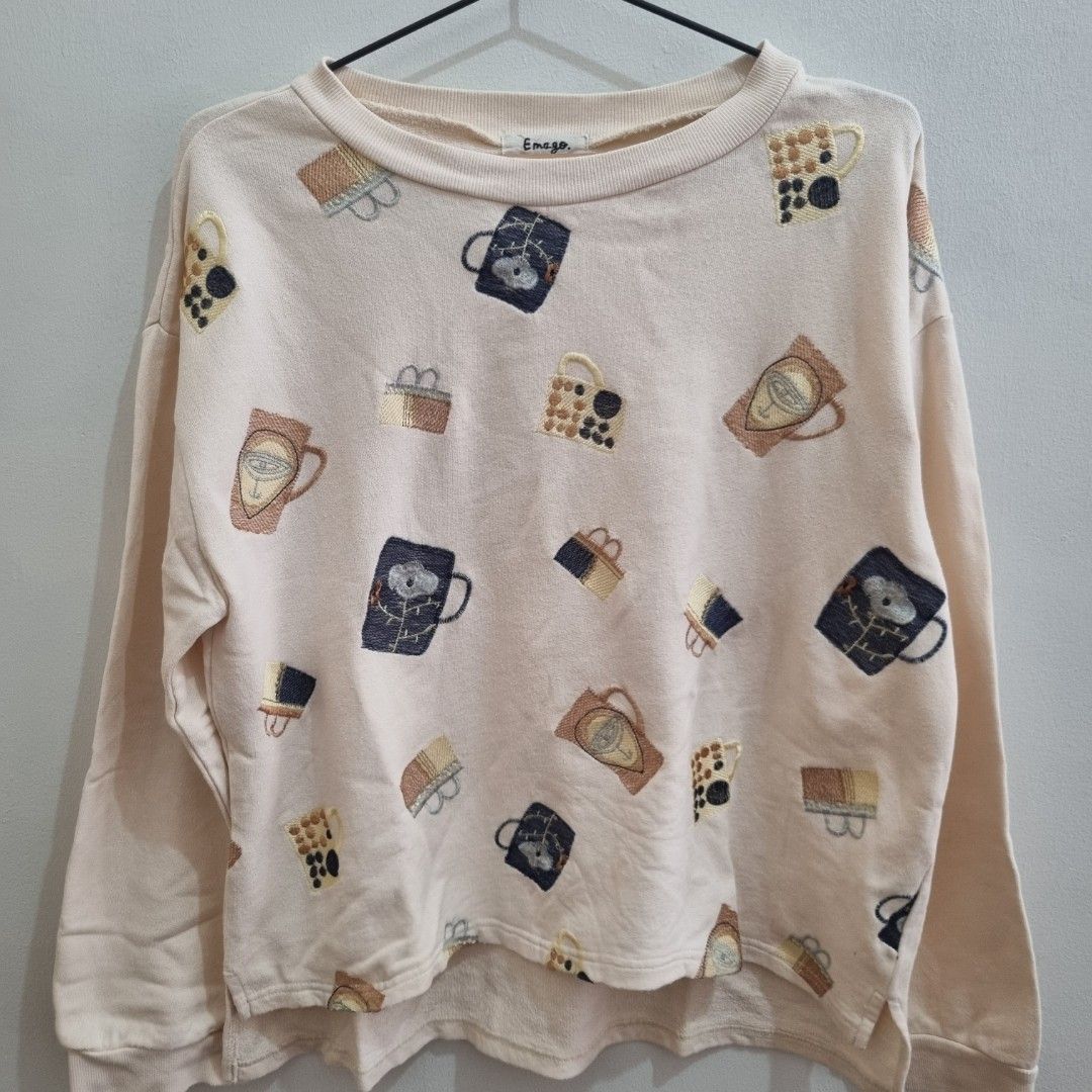 Emago Japan Embroidered Pattern Sweatshirt for winter (Category: Coats, Jackets and Outerwear) located in Manila. Submitted by hellostreetmarket_ (Listing ID 1430039750, Image 3). Description: size -fits small to large recommended for winter use patterns are embroidered.