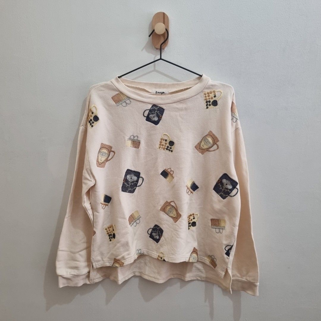 Emago Japan Embroidered Pattern Sweatshirt for winter (Category: Coats, Jackets and Outerwear) located in Manila. Submitted by hellostreetmarket_ (Listing ID 1430039750, Image 2). Description: size -fits small to large recommended for winter use patterns are embroidered.