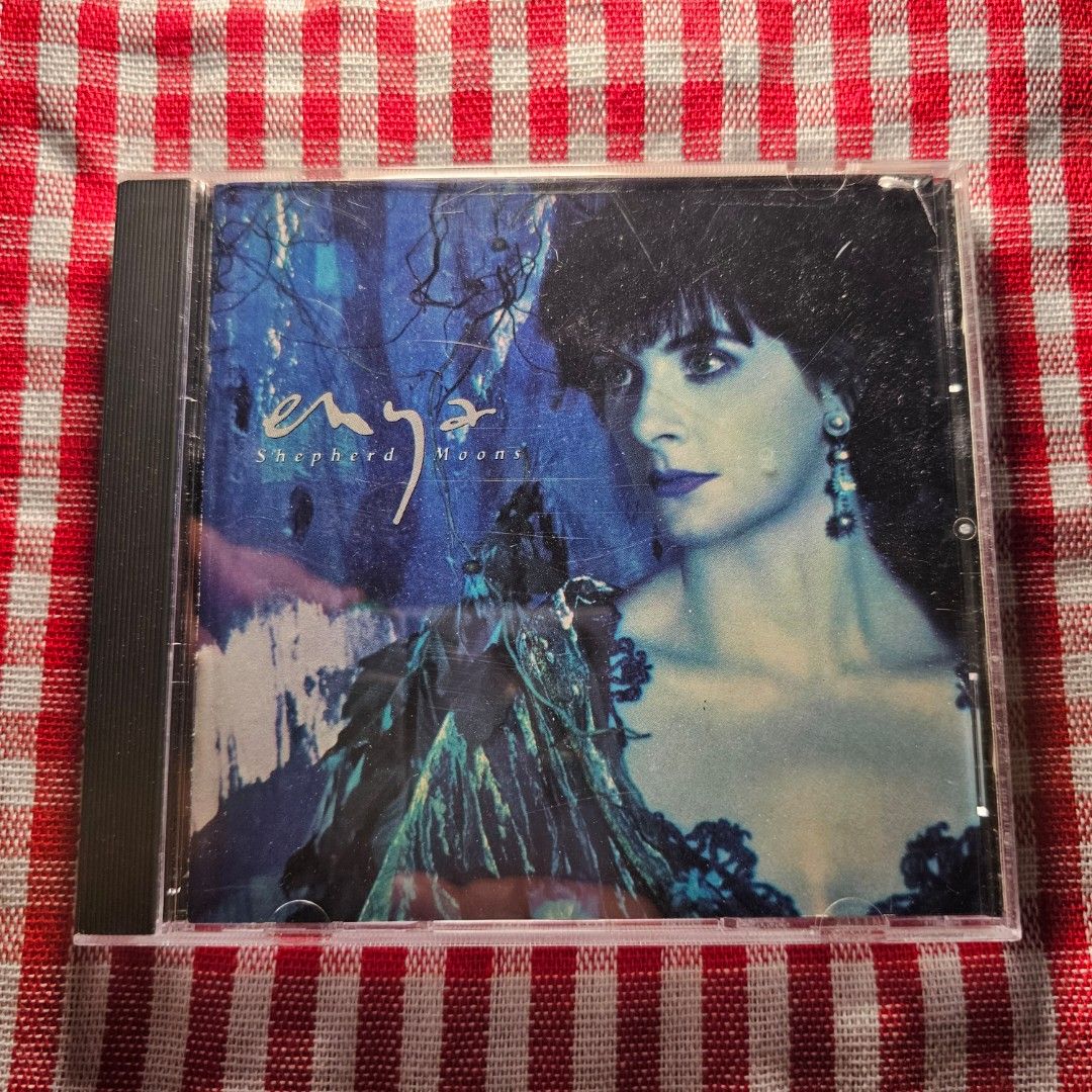 Enya Shepherd Moons CD - CD Mint (Category: CDs & DVDs) located in Quezon City. Submitted by serefrenpaz (Listing ID 1430181341, Image 1). Description: CD of Enya's album, Shepherd Moons. The CD case and disc are included. The album features tracks like Caribbean Blue, Angeles, and Marble Halls. The CD case has some minor scratches..
