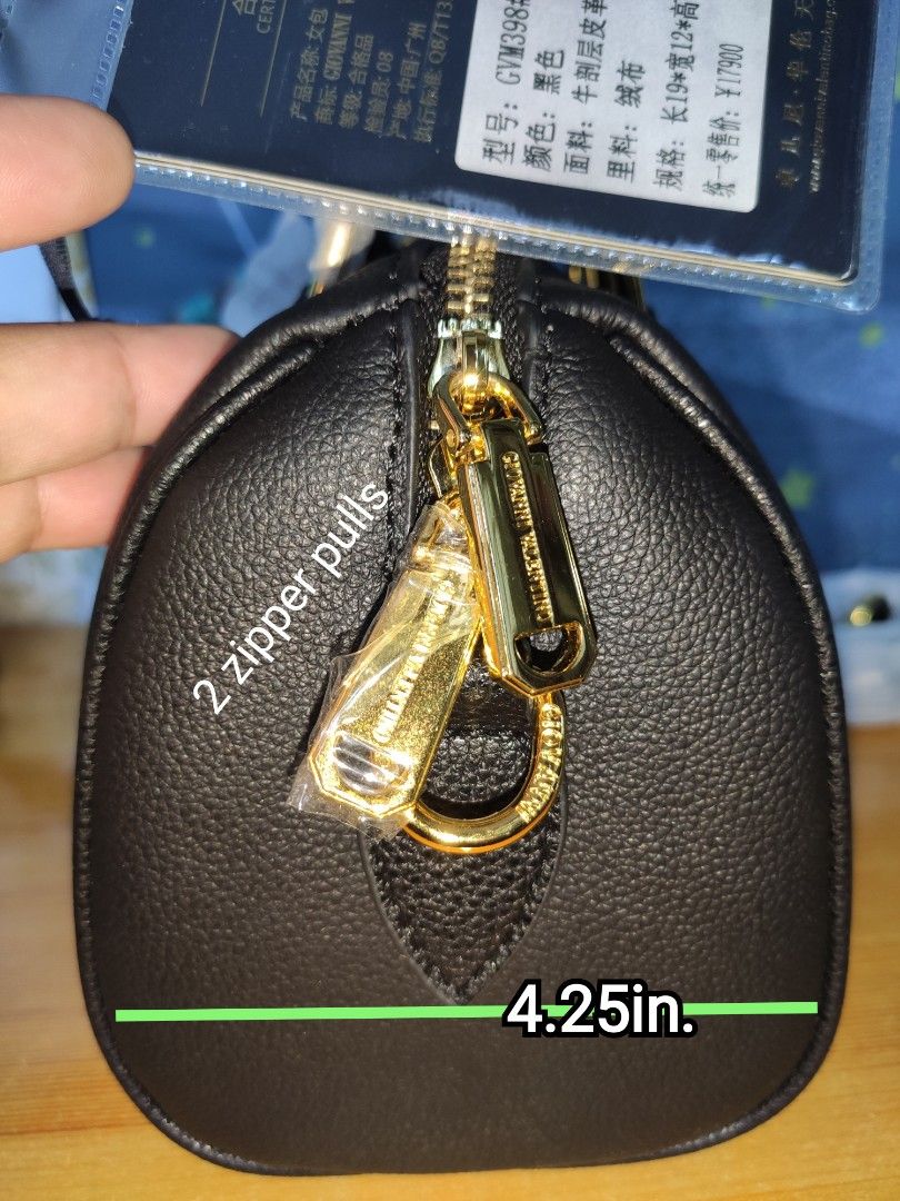 Giovanni Valentino Black Handbag (Category: Luxury Bags & Wallets) located in Rizal. Submitted by baltiq (Listing ID 1430113763, Image 3). Description: Giovanni Valentino ✔️mini doctors style bag ✔️black top handle, detachable shoulder strap ✔️ with bag charm with a key holder ✔️all gold hardwares brand engraved ✔️7.25 inL, 5.25 in.Ht., a4.25 in.W 📌imported HK brand, BNWT 💰MOP: GCash.