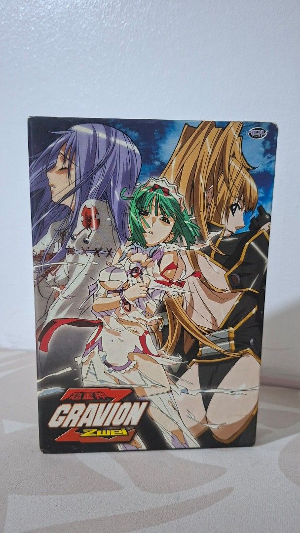 Gravion Zwei Complete Collection DVD (Category: CDs & DVDs) located in Imus. Submitted by pick_and_dig (Listing ID 1430107168, Image 3). Description: Complete collection of Gravion Zwei anime series on DVD. Includes all 12 episodes across three discs. Features original artwork on the box and disc labels. Each disc is housed in its own case. The box set contains the complete collection of the anime series. As is. MOP: GCash, Maya.