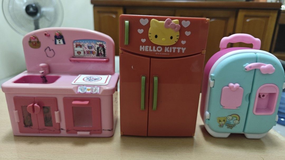 Hello Kitty Toy Kitchen Set (Category: Kids Toys) located in Manila. Submitted by skyreva (Listing ID 1430164059, Image 1). Description: Toy kitchen set includes a kitchen sink, a refrigerator, and a luggage. The refrigerator has the Hello Kitty logo on it. As is. Need a little cleaning..