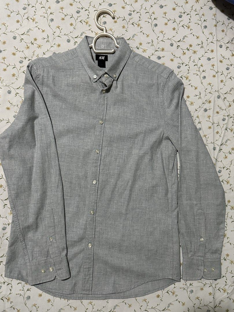 H&M Gray Long Sleeve Shirt (Category: Tshirts & Polo Shirts ) located in Manila. Submitted by p2129_ (Listing ID 1430073845, Image 1). Description: H&M longsleeves grey Small Pit to pit: 19 inches Length: 27.5 inches Buttons are complete #h&m #uniqlo #zara #longsleeves.