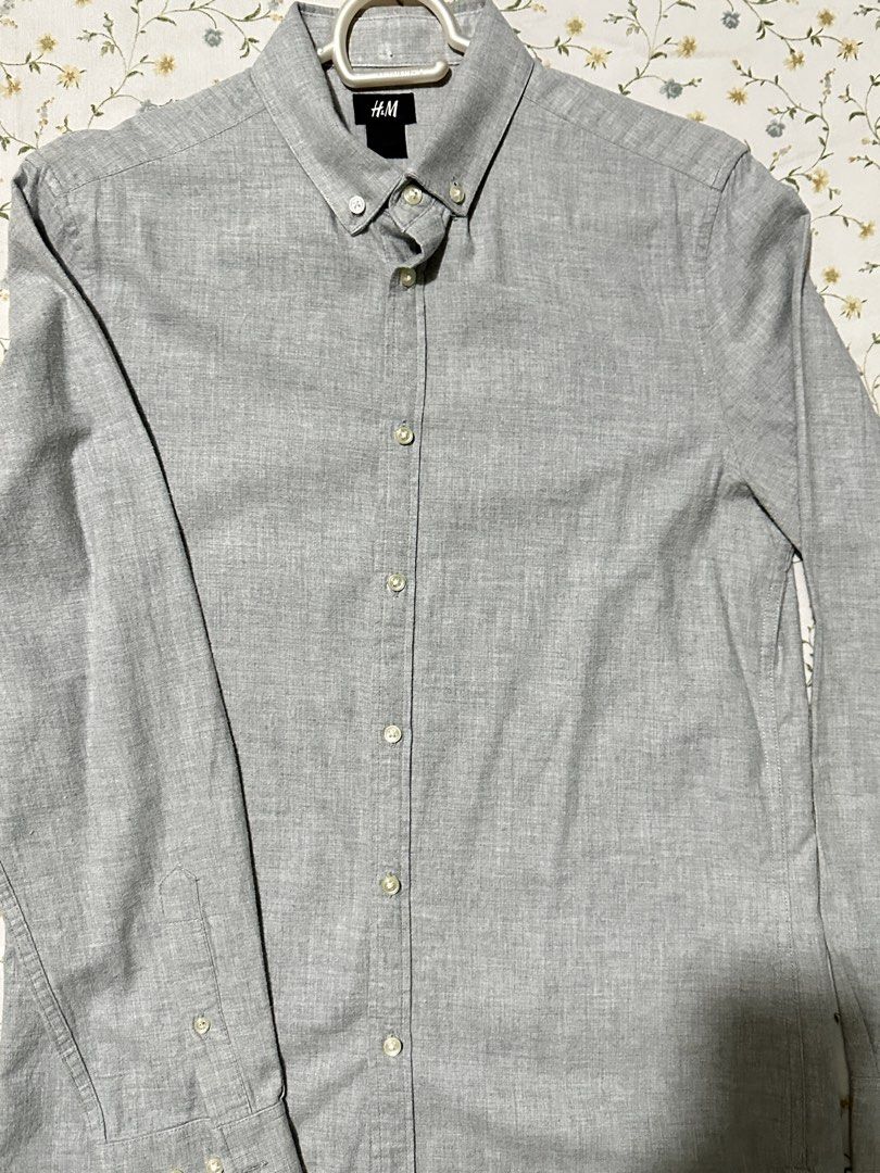 H&M Gray Long Sleeve Shirt (Category: Tshirts & Polo Shirts ) located in Manila. Submitted by p2129_ (Listing ID 1430073845, Image 2). Description: H&M longsleeves grey Small Pit to pit: 19 inches Length: 27.5 inches Buttons are complete #h&m #uniqlo #zara #longsleeves.