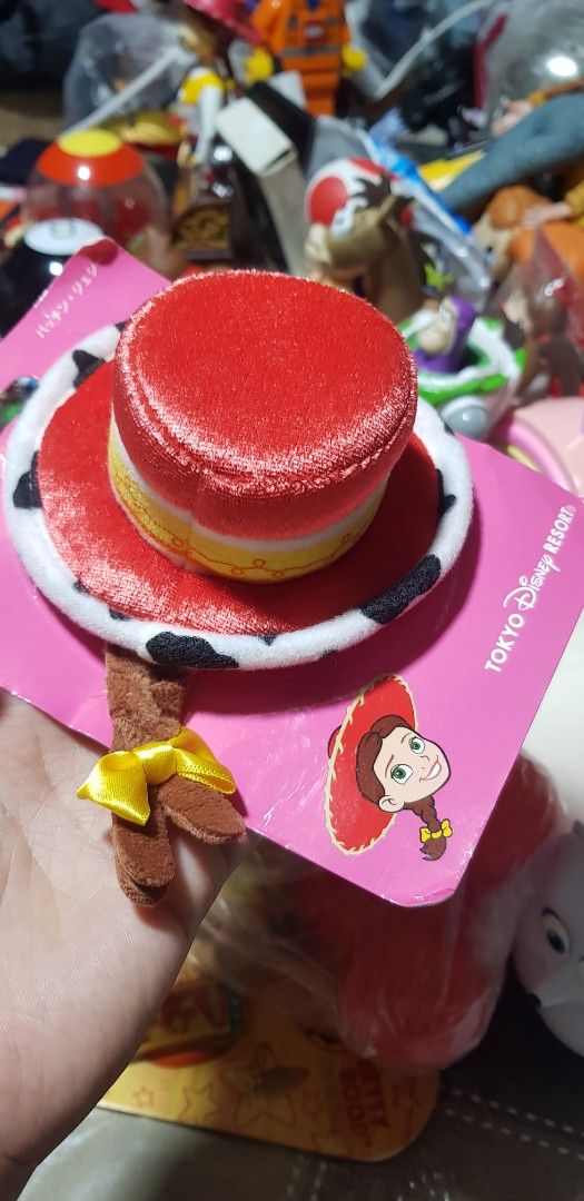 Jessie Hat Hair Clip (Category: Looking For) located in Manila. Submitted by jhs31 (Listing ID 1430146542, Image 1). Description: - Jessie Hat hair clip - good as new - Tokyo Disney Resort - Soft material pm for more details. Loc. Tondo Manila.