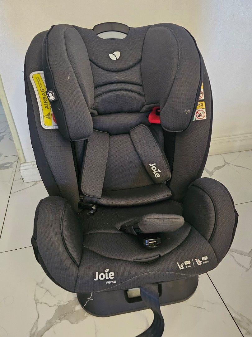 Joie Verso Car Seat (Category: Car Seats) located in Pasig City. Submitted by mommygogo (Listing ID 1430116333, Image 2). Description: Joie Verso car seat is designed for safety and comfort. It features a dark grey color and has adjustable headrest and side impact protection. The seat has a harness system and is suitable for various age groups. It includes a headrest and side impact protection. The seat is designed to provide a secure and comfort