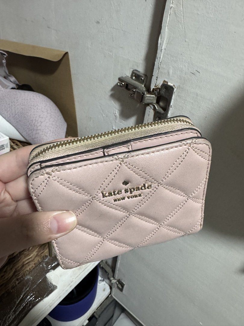 Kate Spade Natalia Small Zip Around Wallet (Category: Wallets & Card holders) located in Manila. Submitted by annchariz (Listing ID 1430059014, Image 3). Description: Kate Spade Natalia Small Zip Around Wallet 3.94’’ h x 4.25’’ w x 1.65’’ Quilted leather Two way spade jacquard lining interior: 6 credit card slots, bill fold, zip around coin compartment with a center divider exterior: id window, slip pocket snap & zip closure RFS not used anymore 