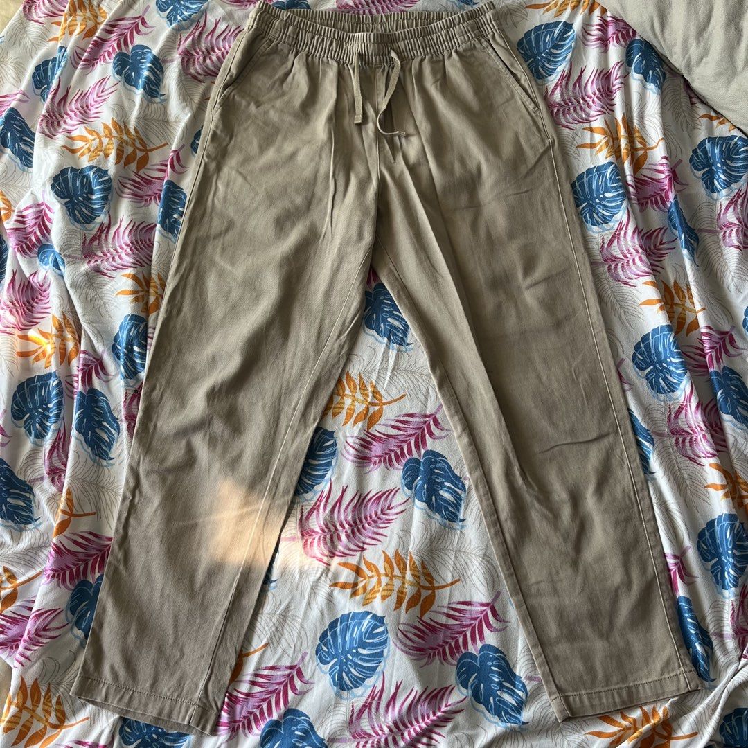 Khakis Giordano Pants - Size S (Category: Jeans) located in San Juan City. Submitted by 1104basics (Listing ID 1430069846, Image 3). Description: Khaki-colored pants from Giordano. Features an elastic waistband with a drawstring. Size S. Waist measures approximately 13 inches unstretched and 19 inches stretched. Inseam is approximately 35 inches. Has two front pockets. .