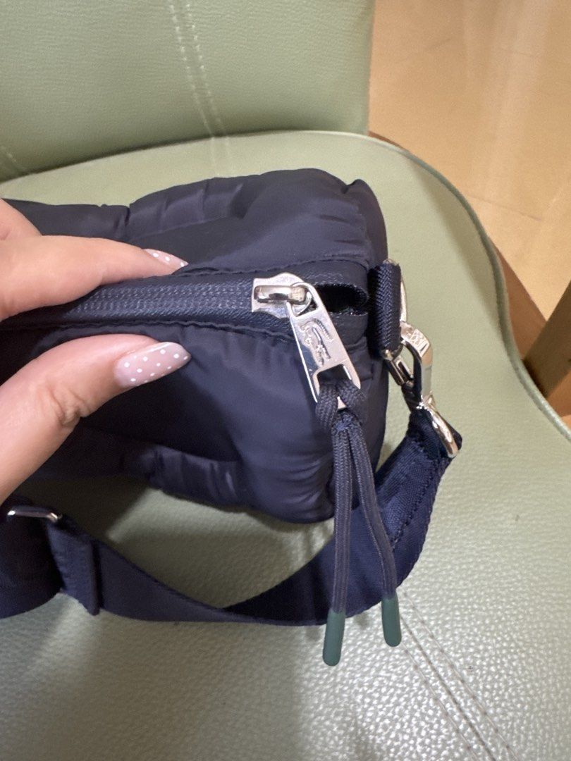 Lacoste Roll Bag (Category: Cross-body Bags) located in Los Banos. Submitted by declutterbycee (Listing ID 1430111130, Image 3). Description: Color is navy blue in actual .