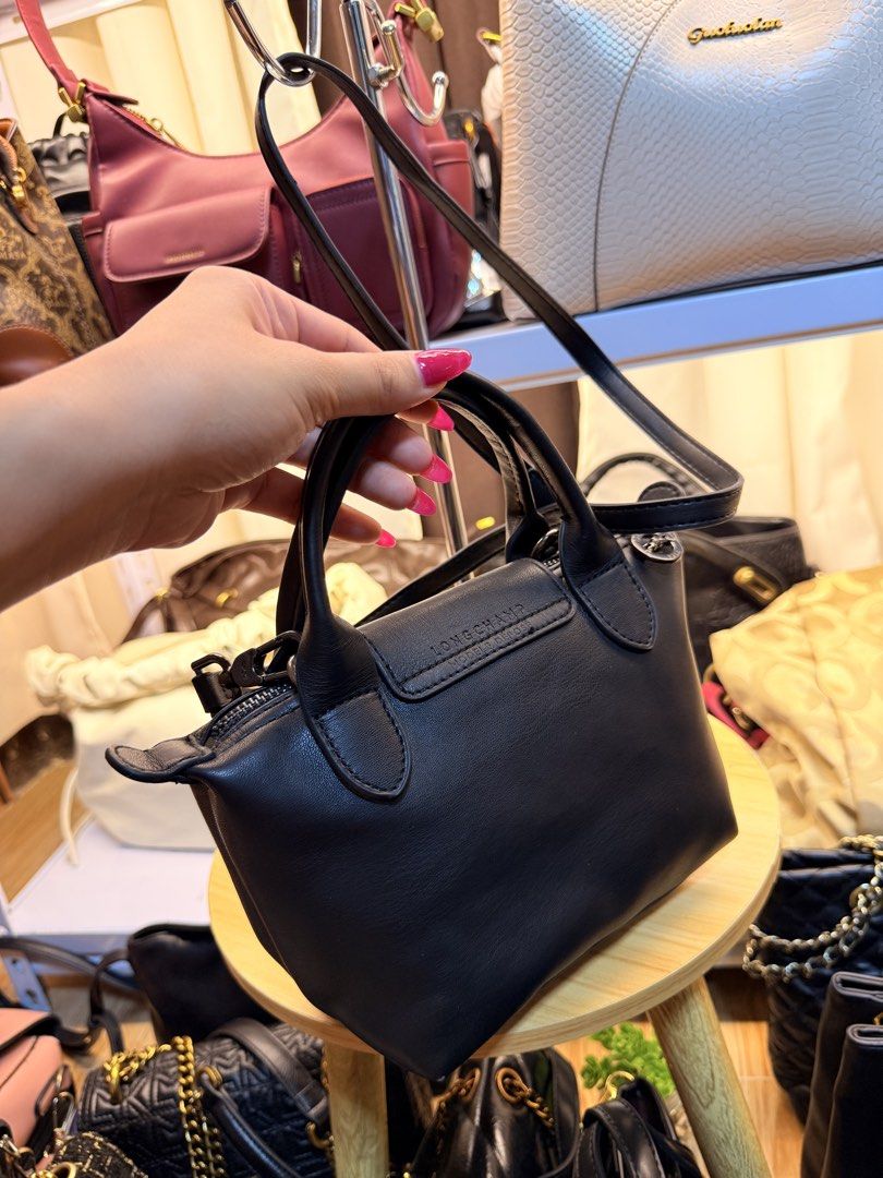 Longchamp Le Pliage Cuir Mini Bag (Category: Luxury Bags & Wallets) located in Manila. Submitted by prince051097 (Listing ID 1430106241, Image 3). Description: No issue.