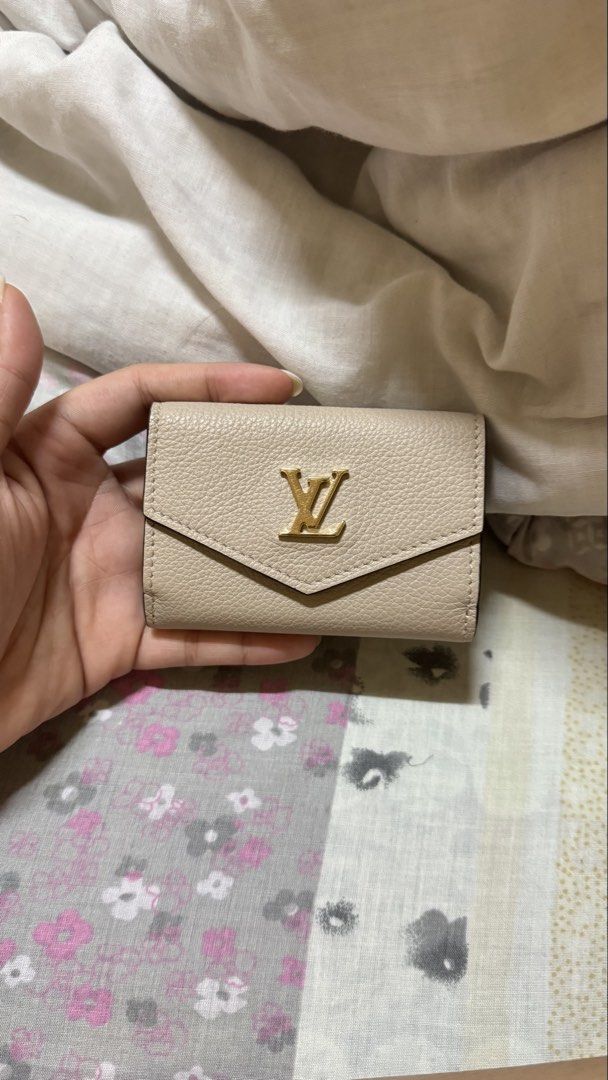 RUSH!!Louis Vuitton Lockmini Wallet (Category: Luxury Bags & Wallets) located in Manila. Submitted by formo (Listing ID 1430149580, Image 1). Description: FOR SALE Louis Vuitton Lockmini Wallet Condition: Like new Inclusion: Wallet and Receipt Bought in Japan – March 26 Price: ₱18,000 (negotiable) Location: San Fernando, Pampanga Shipping: Lalamove / J&T / LBC PM for more photos and details..