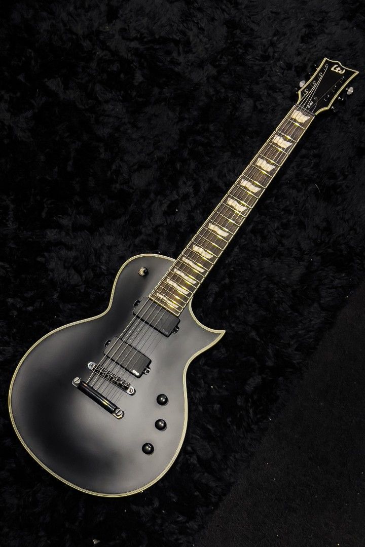 LTD EC407 Electric Guitar (Category: Musical Instruments) located in Manila. Submitted by jasoncammayo (Listing ID 1430214490, Image 2). Description: Brand new, still in the box Body & Construction Body Material: Mahogany Finish: See Thru Purple Sunburst Construction: Set Thru Color: Black Satin Neck & Fingerboard Neck Material: 3 pcs Mahogany Neck Contour: Thin U Scale Length: 24.75" Fingerboard Material: Macassar Ebony Nut Type: Locking Frets: 