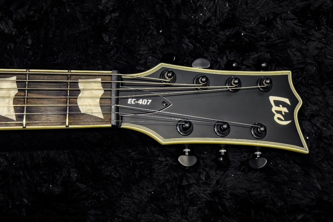 LTD EC407 Electric Guitar (Category: Musical Instruments) located in Manila. Submitted by jasoncammayo (Listing ID 1430214490, Image 3). Description: Brand new, still in the box Body & Construction Body Material: Mahogany Finish: See Thru Purple Sunburst Construction: Set Thru Color: Black Satin Neck & Fingerboard Neck Material: 3 pcs Mahogany Neck Contour: Thin U Scale Length: 24.75" Fingerboard Material: Macassar Ebony Nut Type: Locking Frets: 