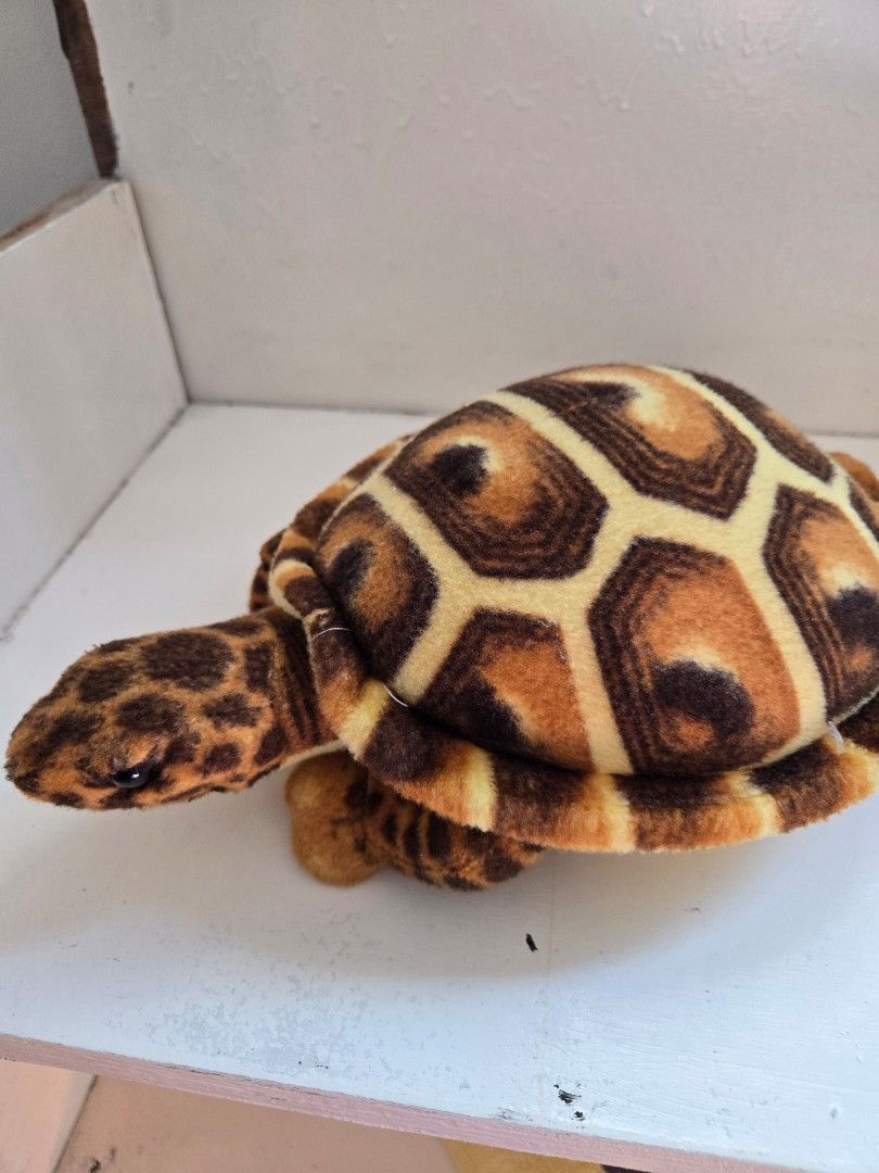 Manila Ocean Park Turtle Plushie (Category: Plushies & Soft Toys) located in Bacoor. Submitted by mishindeclutter (Listing ID 1430092747, Image 2). Description: Adorable turtle plushie is from Manila Ocean Park. It features a detailed shell pattern and a soft, plush body. The tag is still attached. It is a great collectible or a cuddly companion. The turtle measures approximately 8 inches in length..