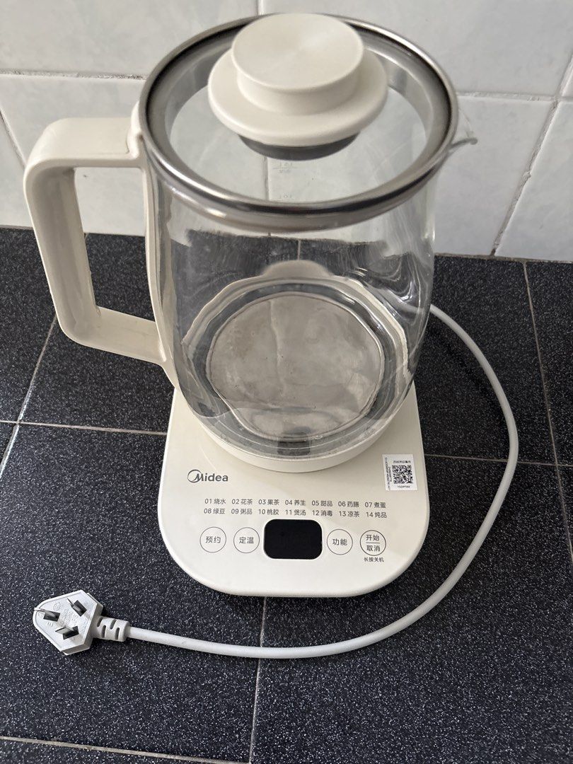 Midea Multi-Function Electric Kettle (Category: Kettles & Airpots) located in Singapore. Submitted by sknowz (Listing ID 1430071839, Image 1). Description: Lightly used. 2L negligible stain from brewing black beans. Strictly not for fussy buyer. Strictly self collect or buyer pay for postage/courier. .