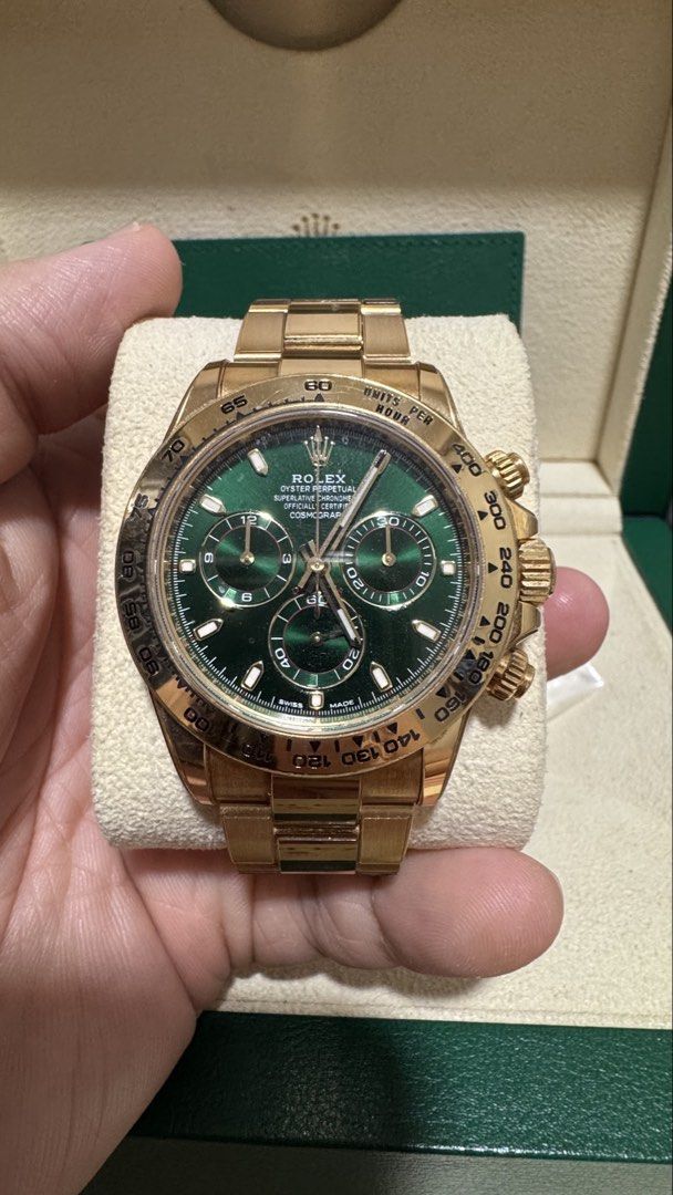 MINT MARCH 2020 Rolex Daytona Yellow Gold (John Mayor) 116508 Green Dial 40mm (Category: Watches) located in Singapore. Submitted by bandofbrothers (Listing ID 1430118575, Image 2). Description: Mint Rolex Daytona ‘John Mayor’ Green Dial Brand: Rolex Model: 116508 Condition: Mint Dial: Green Case Diameter: 40mm Movement: Automatic Material: Yellow Gold Bracelet: Yellow Gold Original Box: Yes Original Cert/Papers: Yes Dated: March 2020 (No White T