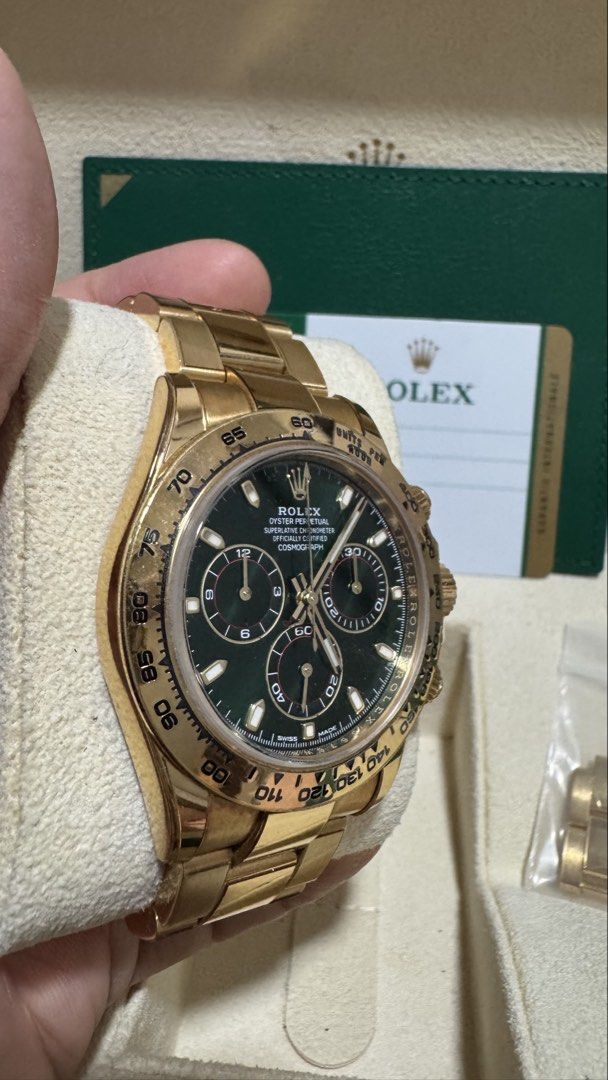 MINT MARCH 2020 Rolex Daytona Yellow Gold (John Mayor) 116508 Green Dial 40mm (Category: Watches) located in Singapore. Submitted by bandofbrothers (Listing ID 1430118575, Image 3). Description: Mint Rolex Daytona ‘John Mayor’ Green Dial Brand: Rolex Model: 116508 Condition: Mint Dial: Green Case Diameter: 40mm Movement: Automatic Material: Yellow Gold Bracelet: Yellow Gold Original Box: Yes Original Cert/Papers: Yes Dated: March 2020 (No White T
