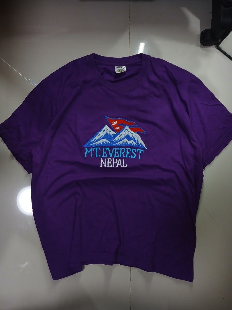 MT. EVEREST NEPAL GRAPHIC TEE (Category: Tshirts & Polo Shirts ) located in Davao. Submitted by reworn.dvo (Listing ID 1430124308, Image 1). Description: Size: M Width: 22in Length: 26in Condition: 10/10 Issue: small dot stain(last slide) Grab: 300(Automatically yours!) .