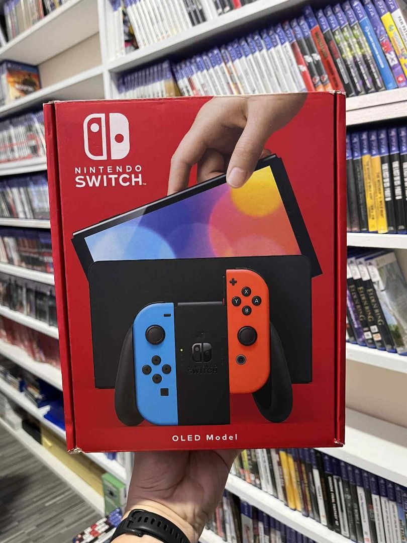 Nintendo Switch Consoles (Category: Nintendo) located in Manila. Submitted by earlelizan41906 (Listing ID 1430034981, Image 1). Description: " 🎮 NINTENDO SWITCH CONSOLES - used, pre owned, no issues - complete with all accessories ✔️ NON-JAILBREAK - no games, physical games are sold separately P4,995 - NS Lite (gray, no box) P5,495 - NS Lite (gray, w/ box) P6,995 - NS Lite Blue (brand new) P10,995 - NS OLED White (almost new, 2 months old) P10,9