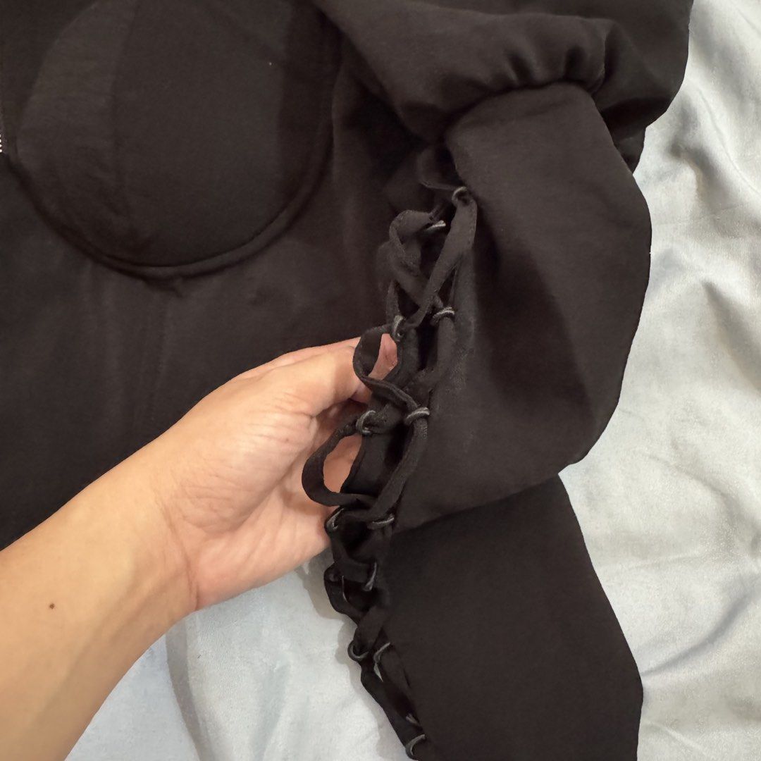 Oh Polly Black Corset Top (Category: Sleeveless) located in Aloran. Submitted by kheyx (Listing ID 1430067629, Image 3). Description: UK 4 US 2 padded, puff top super nice for formal events crisscross design sa arms never used.